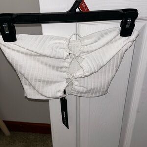 New with tag. White Size small tube top with ties in front